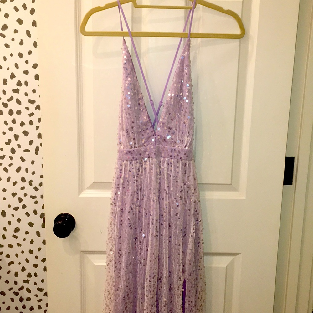 Long sequined dress with front side slit